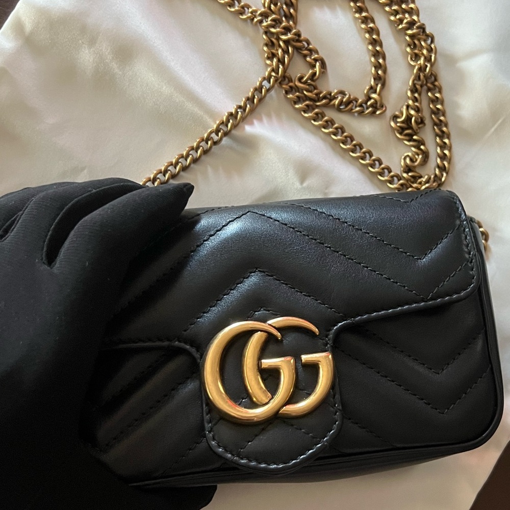 Gucci Black Quilted Leather Mini Bag with Gold GG Chain